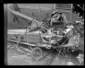 Navy plane crashes into house at Quincy, MA. Two men live by jumping with parachutes