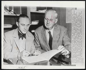 Shantz Signs Two-Year Contract With A's - Little Bobby Shantz, left, southpaw pitcher named most valuable player in the American League in 1952, signs a two-year contract with the Philadelphia Athletics today as General Manager Art Ehlers watches. Terms of the contract were not made public but it was reported reliably that it was in excess of $50,000 for the two years. Ehlers did say, however, that Shantz was the "highest paid pitcher in the history of the club, including Lefty Grove."