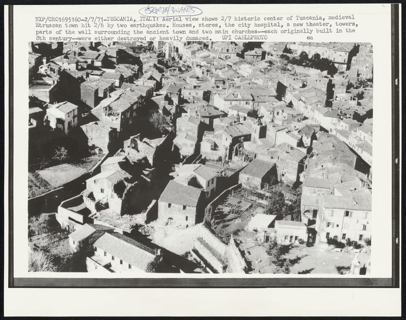 Aerial view shown 2/7 historic center of Tuscania, medieval Etruscan town hit 2/6 by two earthquakes. Houses, stores, the city hospital, a new theater, towers, parts of the wall surrounding the ancient town and two main churches--each originally built in the 8th century--were either destroyed or heavily damaged.