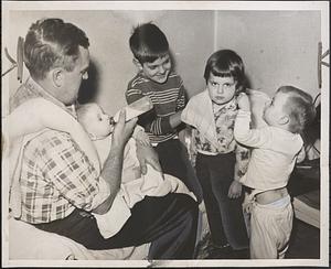 John Frazier, husband of jailed Dorchester woman, with children