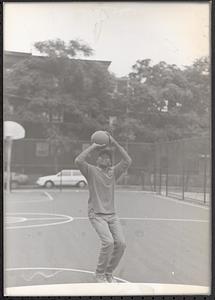 Donovan Thomas shooting a basketball