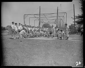 Showing the proper swing at the Archie Allen Baseball School