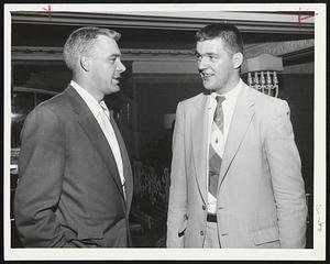 Two Snappy Tigers in town to battle Red Sox, Harvey Kuenn (left) and Billy Hoeft seem to be stalled in Hotel Kenmore lobby while trying to decide what movie to take while marking time for tonight's game.