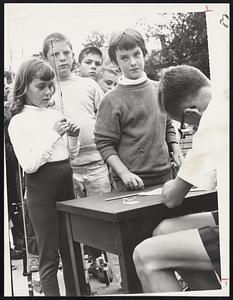 Registration at Fishing Rodeo Left Mary Connolly of Dor. age 9 Ann Flaherty of Brookline age 9- Richard Kelley of Parks Dept. at Desks.