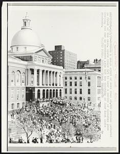 A large crowd of more than 10,000 persons gathered in front of the Mass. State House 5/5 to hear a series of speeches protesting the war in southeast Asia and the shooting of four Kent State students.
