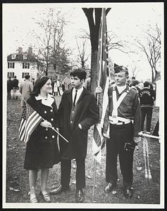 Rosemary Meehan, holding small flag, and David Luca