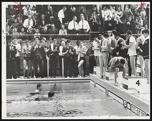 Schollander Swim Scenes-Olympic champion Don Schollander (forefront, left photo) chats in pool with Harvard's Bill Shrout after pacing Yale fresh-