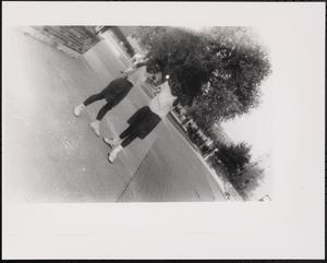 Two girls in school uniforms