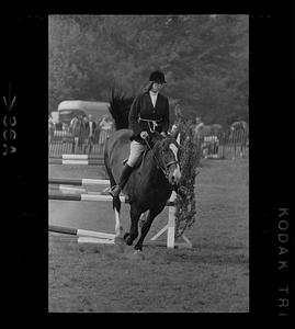 Horse jumping at riding meet, Dedham