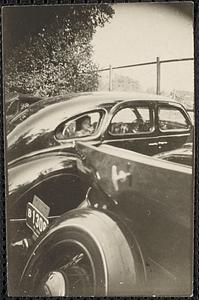 Woman sitting in the backseat of a car