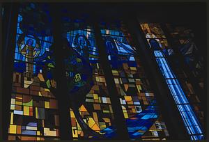 Stained glass windows depicting Christ and Apostles