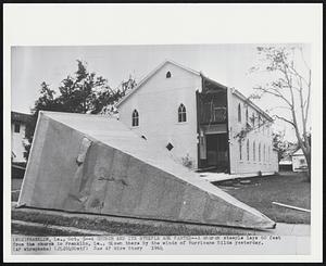 A Church And Its Steeple Are Parted--A church steeple lays 60 feet from the church in Franklin, La., blown there by the winds of Hurricane Hilda yesterday.