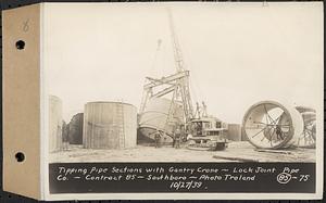 Contract No. 85, Manufacture and Delivery of Precast Concrete Steel Cylinder Pipe, Southborough, Framingham, Wayland, Natick, Weston, tipping pipe sections with gantry crane, Southborough, Mass., Oct. 27, 1939