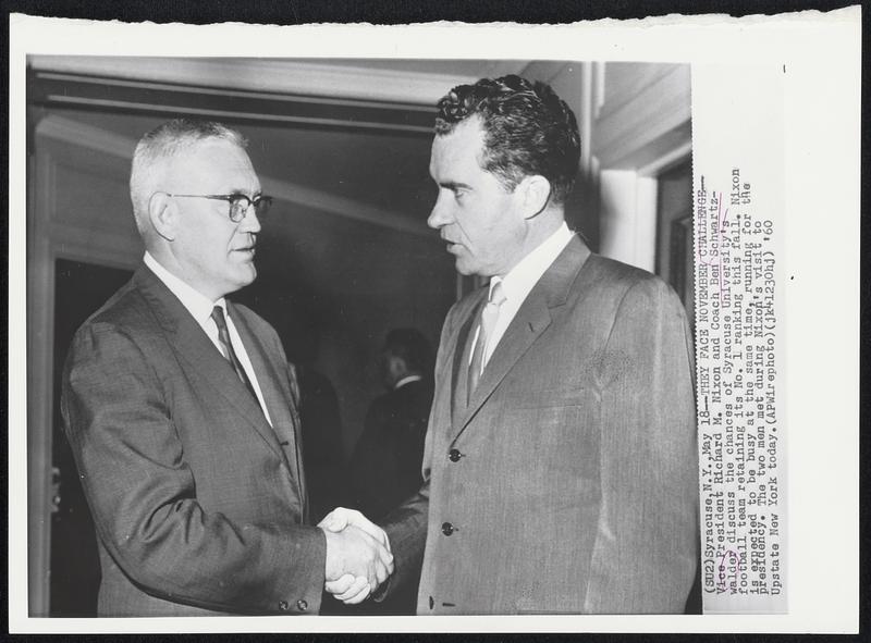 They Face November Challenge--Vice President Richard M. Nixon and Coach Ben Schwartzwalder discuss the chances of Syracuse University's football team retaining its No. 1 ranking this fall. Nixon is expected to be busy at the same time, running for the presidency. The two men met during Nixon's visit to Upstate New York today.