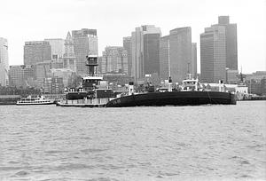 Barge and tug in harbor