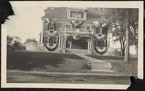 Large house decorated with patriotic colors