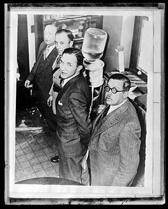 Bruno Richard Hauptmann with three other men