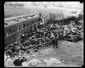 Debris surrounding a wrecked train