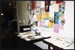 Newton Free Library, Newton, MA. Communications & Programs Office. Bulletin board and tables with pamphlets