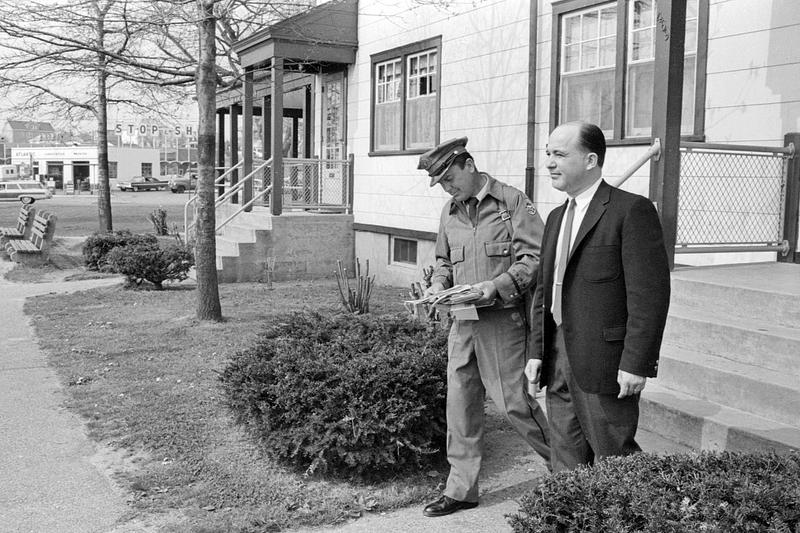 Tony Silva inspecting mail route, Blue Meadows Housing, Dartmouth Street, New Bedford Digital