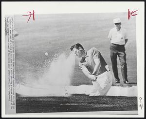 Sanders Blasts From Trap--Doug Sanders scoops his ball and a shower of sand out of a trap on the 16th hole while setting a course record of 30-35--65 in today's first round of the Doral golf invitational.