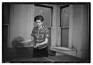 A woman playing table tennis