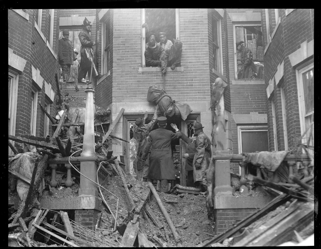 Lowering a body from Lynn apartment house and window after general alarm fire