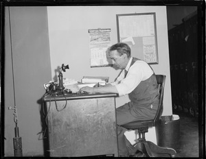 Man at desk at Herald