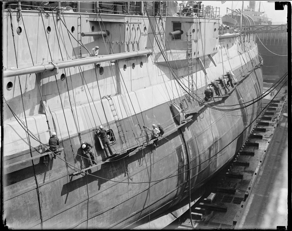 USS Utah in South Boston drydock - showing dents in blisters - damage caused while going through Panama Canal during President Hoover's goodwill trip to South America.