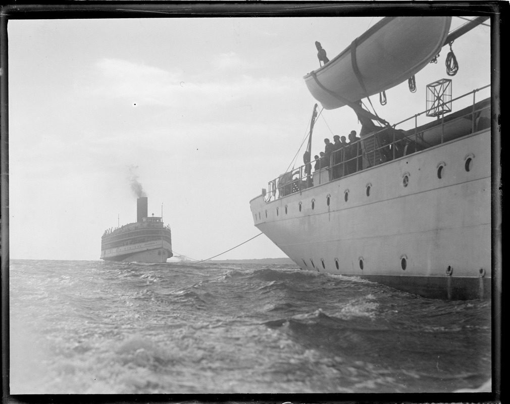 SS Commonwealth being towed into Newport R.I. harbor
