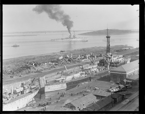 USS Utah in drydock while USS Florida steams by