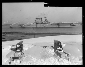 USS Lexington passing old guns on Castle Island