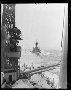 USS Maryland in rough seas during maneuvers in Western Ocean. Photo taken from USS Tennessee.