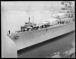 Bow view of USS Northampton. Tug 'Iwana'.