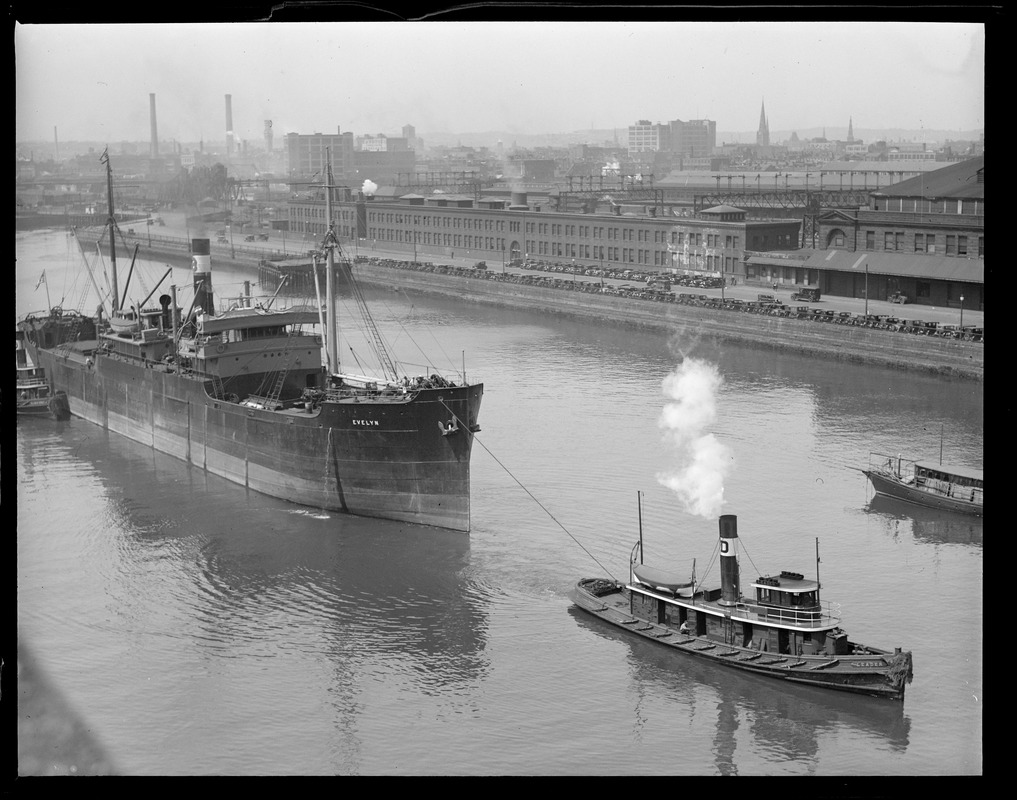 SS Evelyn being towed through the Fort Point Channel along South Station