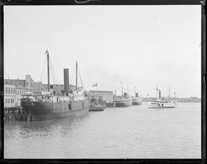 Eastern steamship lines terminal from Northern Ave. Bridge showing Eastern Steamship and Nantasket line boat (Mayflower) easing in (Ferry Narrow Gauger, 'Peeking out') H.T. Dimock, Portsmouth N.H., left