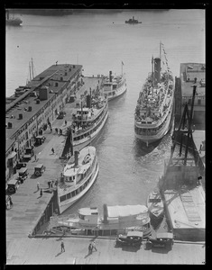 Pleasure fishing boats - old T-Wharf. Excursion steamers: Dorothy Bradford on Right, Newcastle left front, Nahant rear left? King Philip - left middle