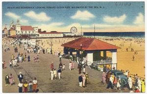 Beach and boardwalk looking toward ocean pier, Wildwood by the Sea, N. J.