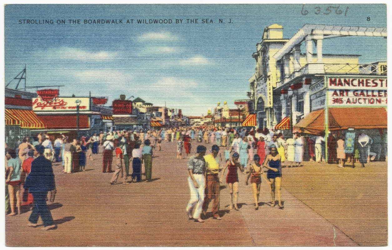 Strolling on the boardwalk at Wildwood by the Sea, N. J.