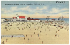 Beach scene, looking towards Ocean Pier, Wildwood, N. J.