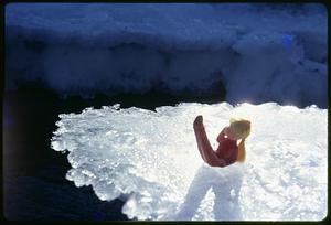 Figurine of a woman on ice