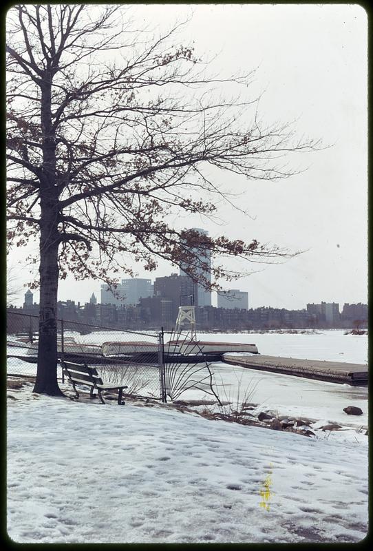 A snowy bank and frozen river