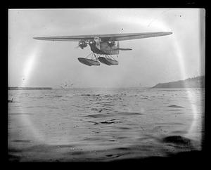 Byrd's South Pole plane taking off from Boston Harbor