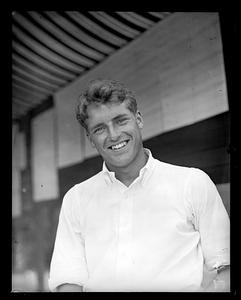 A man smiling to the camera