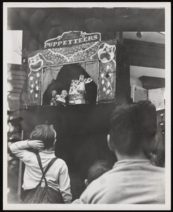 Judy Conklin Peters showing puppets