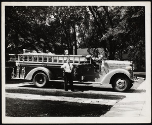 Fire department truck with Francis Shields, foreman
