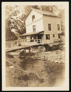 House (still standing) located between Chapel St. and Greenwater Brook (foreground) and showing damage to foundation caused by flood which was the result of 1938 hurricane