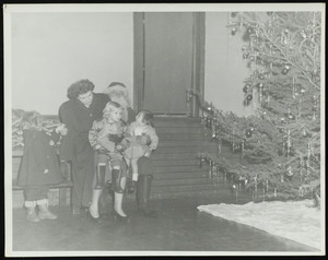 Santa, children and unidentified adult