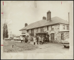 Gathering outside Lee Estate building