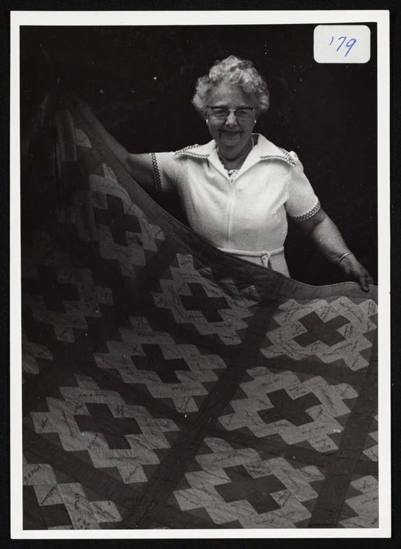 Martha Pierce with His. Soc. quilt, quilt made in 1888 Digital